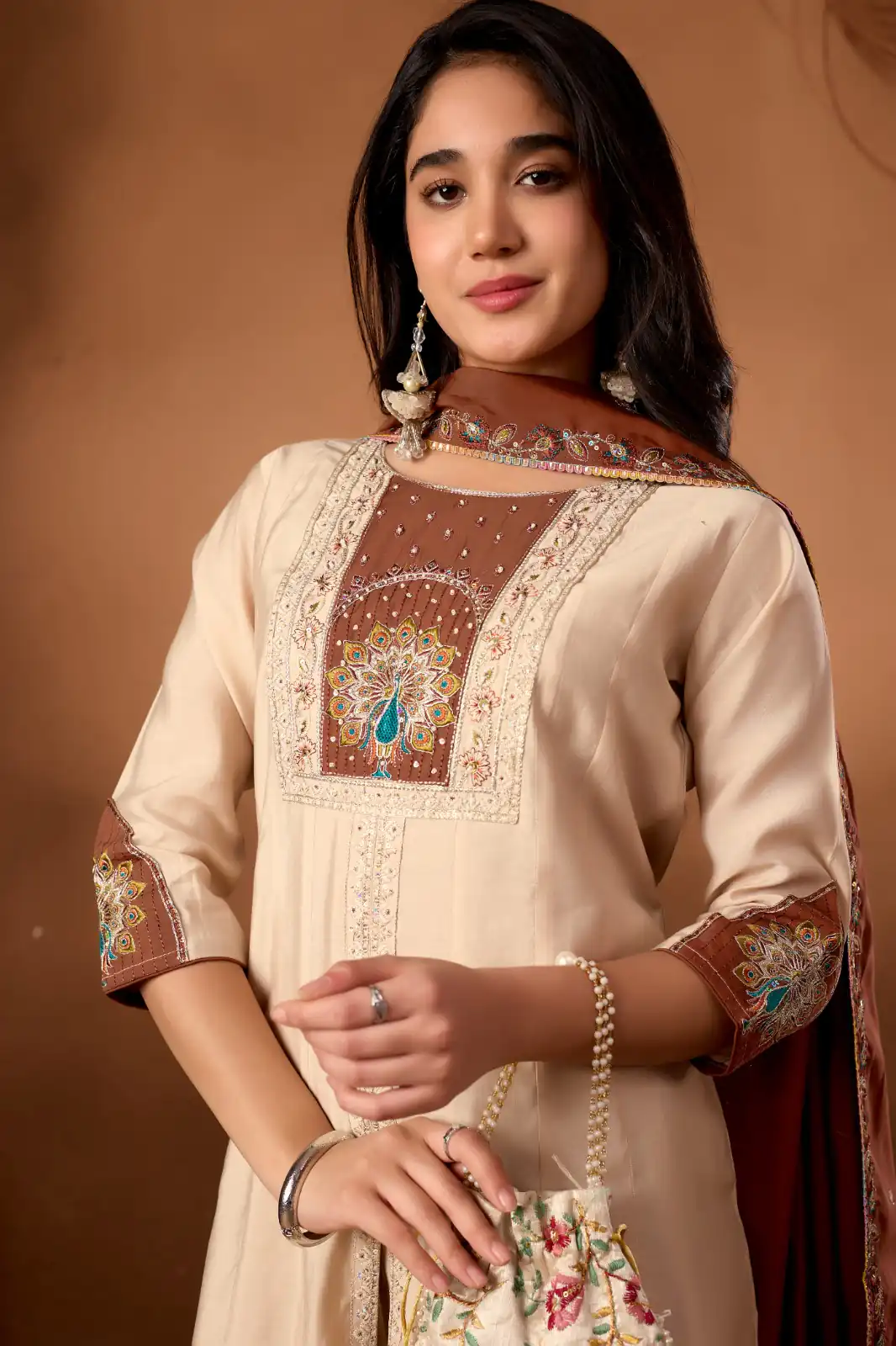 DIVA 150 CreamRoman Silk Salwar Suit with Sequins Work & Embroidery Work. Available at ₹2449 only. Delivery 4-6 Working Days. Shop now. | Jump Suits, Straight Suits, Casual Suits, Creative suits, Designer Suits, Palazzo Suits, Party Wear Suits, Patiala Suits, Salwar suit