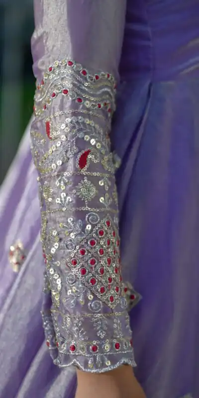 ST 1196 Lavender Color Fendy Satin Gown with Lace Work & Embroidery Work. Get it for ₹2699. Delivery 4-6 Working Days. Shop now. | Bollywood Gowns, Creative Gowns, Designer Gowns, Embroidered Gowns, Gowns, Party Wear Gowns