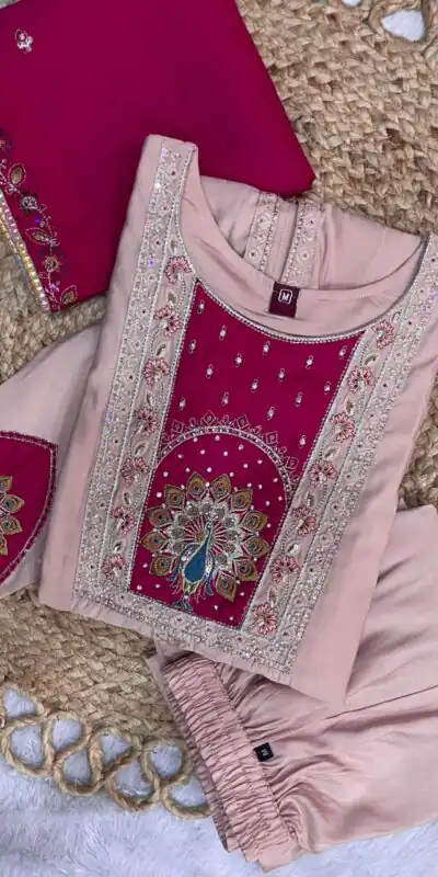 DIVA 150 Peach Roman Silk Salwar Suit with Sequins Work & Embroidery Work. Available at ₹2449 only. Delivery 4-6 Working Days. Shop now. | Jump Suits, Straight Suits, Casual Suits, Creative suits, Designer Suits, Palazzo Suits, Party Wear Suits, Patiala Suits, Salwar suit
