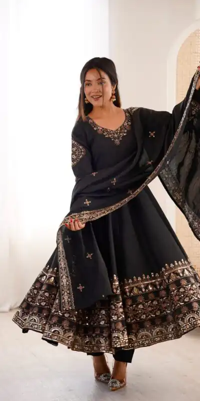 ZF 5016 Black Roman Silk Gown with Embroidery Work. Wedding, Party, Festive, Events, Navratri, Exclusive Offer ₹2499. Delivery 4-6 Working Days. Shop now. | Bollywood Gowns, Creative Gowns, Designer Gowns, Embroidered Gowns, Gowns, Party Wear Gowns