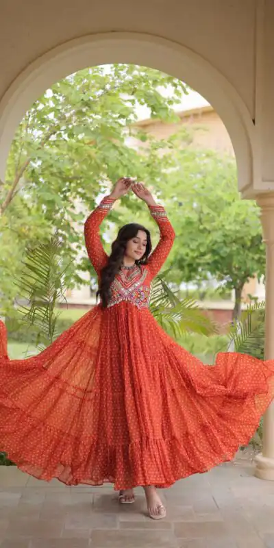 KA 1271 Orange in Colour Faux Georgette Bandhani Print Work Gown. Available at ₹2069 only. Delivery 4-6 Working Days. Shop now. | Bollywood Gowns, Creative Gowns, Designer Gowns, Embroidered Gowns, Gowns, Party Wear Gowns