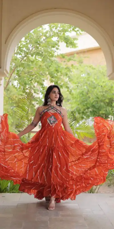 KA 1270 Orange in Colour Faux Georgette Bandhani Print Work Gown. Available at ₹2019 only. Delivery 4-6 Working Days. Shop now. | Bollywood Gowns, Creative Gowns, Designer Gowns, Embroidered Gowns, Gowns, Party Wear Gowns