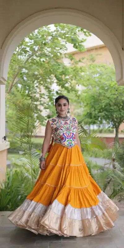 KA 5071 Orange Rayon Embroidery Work & Cowrie Work Lehenga Choli . Grab it for ₹2849. Delivery 4-6 Working Days. Shop now. | Bollywood Lehenga, Creative Lehenga, Designer Lehenga, Embroidered Lehenga, Lehenga, Party Wear Lehenga