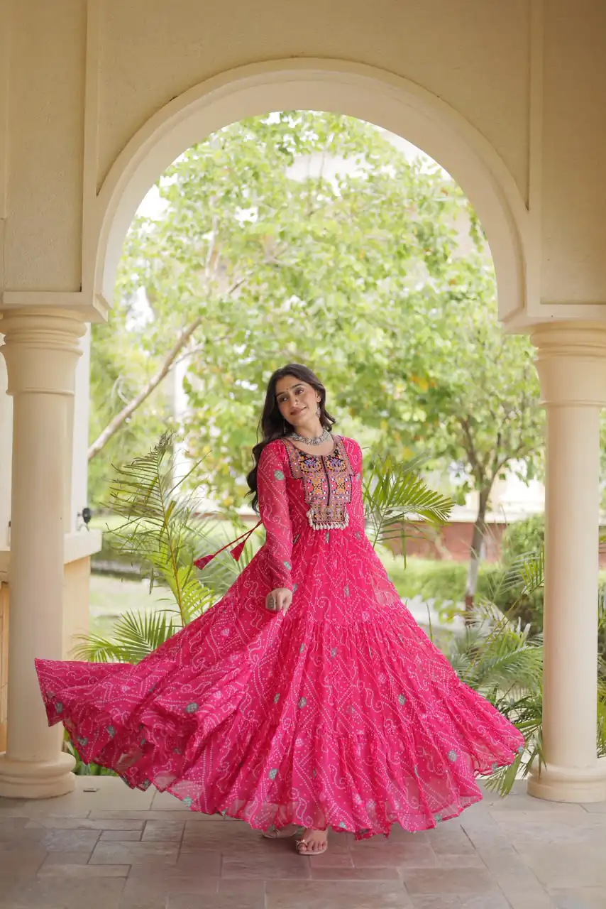 KA 1276 Pink in Colour Faux Georgette Bandhani Print Work Gown. Available at ₹2069 only. Delivery 4-6 Working Days. Shop now. | Bollywood Gowns, Creative Gowns, Designer Gowns, Embroidered Gowns, Gowns, Party Wear Gowns