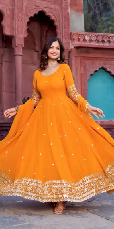 SP 23 Yellow Faux Georgette Gown with Mirror Work & Embroidery Work. Get it for ₹2299. Delivery 4-6 Working Days. Online Shop now. | Bollywood Gowns, Creative Gowns, Designer Gowns, Embroidered Gowns, Gowns, Party Wear Gowns