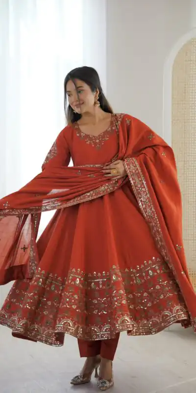 ZF 5016 Orange Roman Silk Gown with Embroidery Work. Wedding, Party, Festive, Events, Navratri, Exclusive Offer ₹2499. Delivery 4-6 Working Days. Shop now. | Bollywood Gowns, Creative Gowns, Designer Gowns, Embroidered Gowns, Gowns, Party Wear Gowns