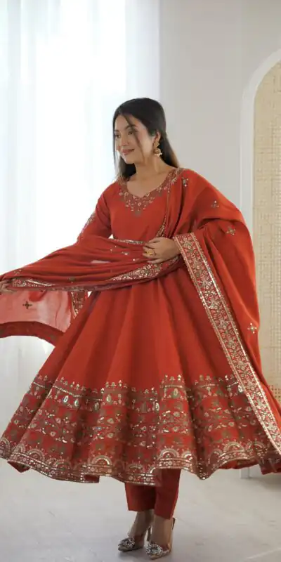 ZF 5016 Orange Roman Silk Gown with Embroidery Work. Wedding, Party, Festive, Events, Navratri, Exclusive Offer ₹2499. Delivery 4-6 Working Days. Shop now. | Bollywood Gowns, Creative Gowns, Designer Gowns, Embroidered Gowns, Gowns, Party Wear Gowns