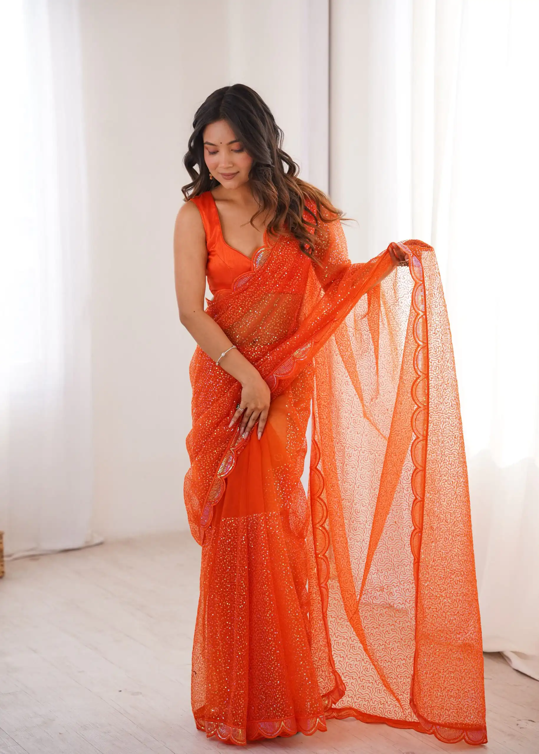 Shiny Orange Soft Net Sequins Work Saree - Image 3