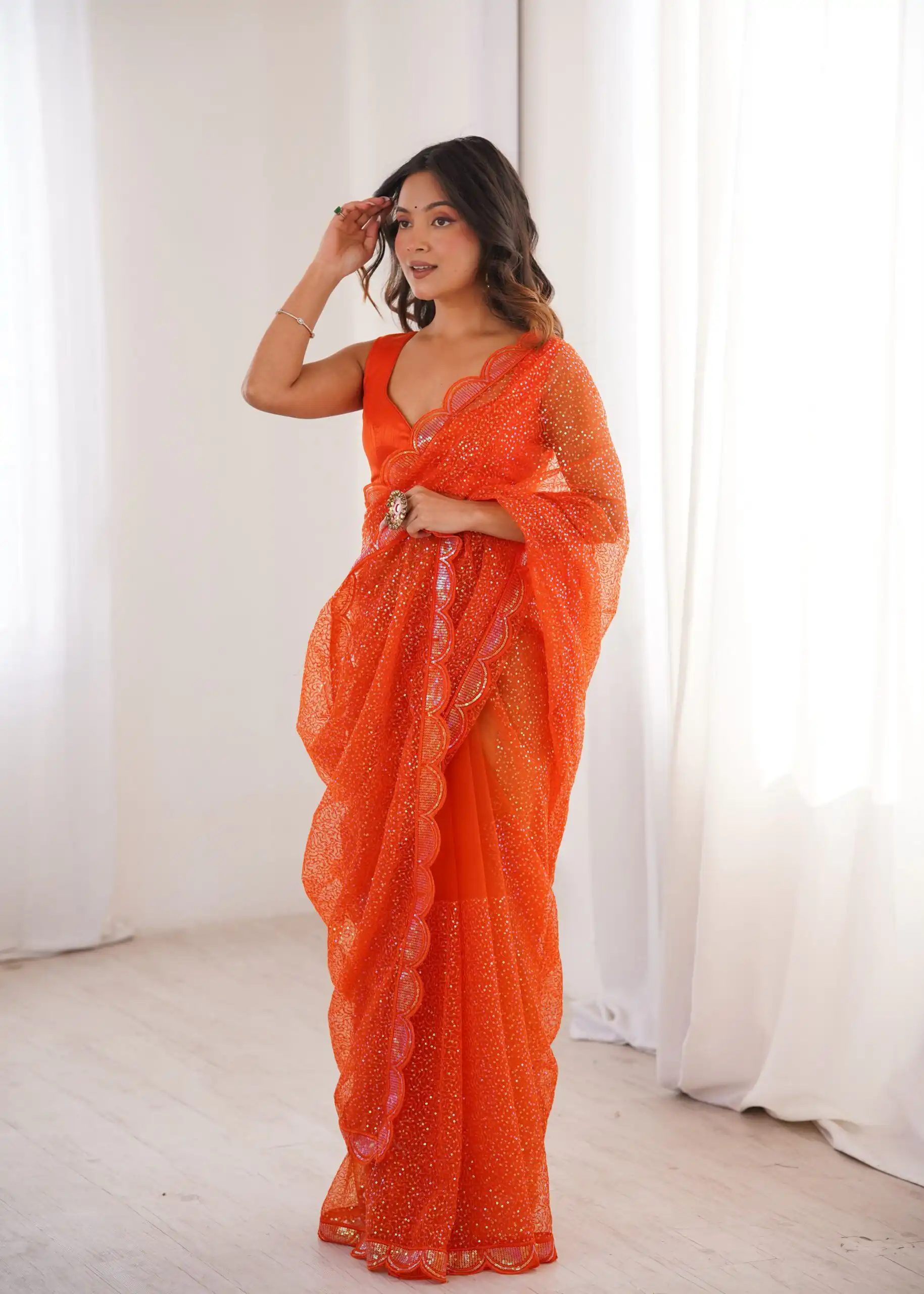 Shiny Orange Soft Net Sequins Work Saree - Image 2