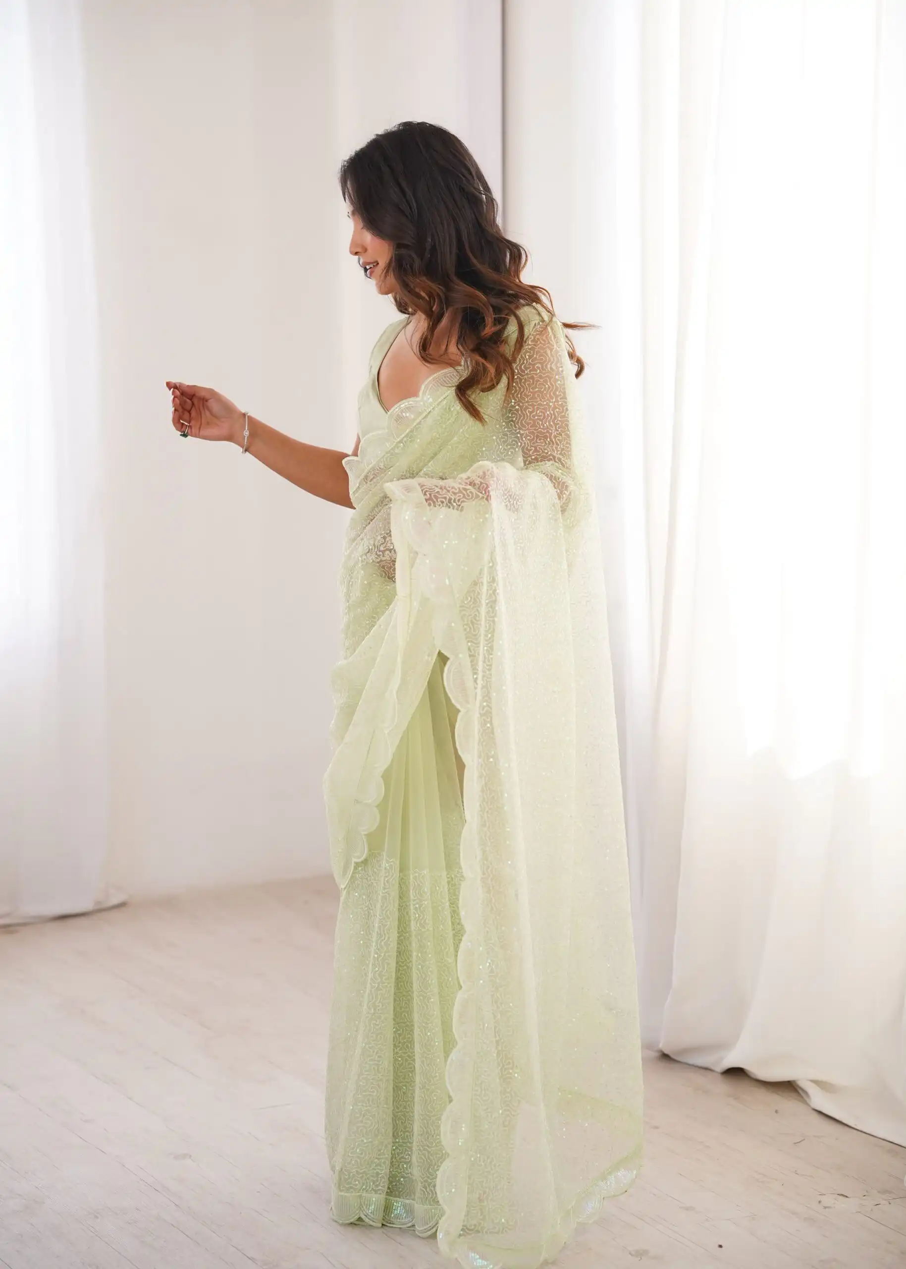 Shiny Pista Soft Net Sequins Work Saree - Image 9