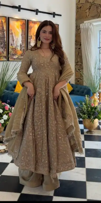 SR 1726 Chiku Fendy Silk Gown with Embroidery Work & Sequins Work. Special Price ₹2899. Delivery 4-6 Working Days. Shop now. | Bollywood Gowns, Creative Gowns, Designer Gowns, Embroidered Gowns, Gowns, Party Wear Gowns