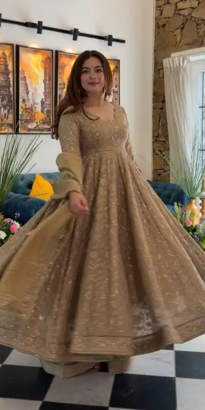 SR 1726 Chiku Fendy Silk Gown with Embroidery Work & Sequins Work. Special Price ₹2899. Delivery 4-6 Working Days. Shop now. | Bollywood Gowns, Creative Gowns, Designer Gowns, Embroidered Gowns, Gowns, Party Wear Gowns