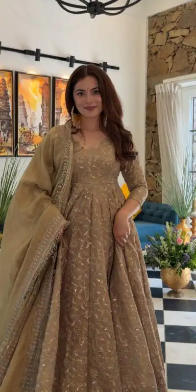 SR 1726 Chiku Fendy Silk Gown with Embroidery Work & Sequins Work. Special Price ₹2899. Delivery 4-6 Working Days. Shop now. | Bollywood Gowns, Creative Gowns, Designer Gowns, Embroidered Gowns, Gowns, Party Wear Gowns
