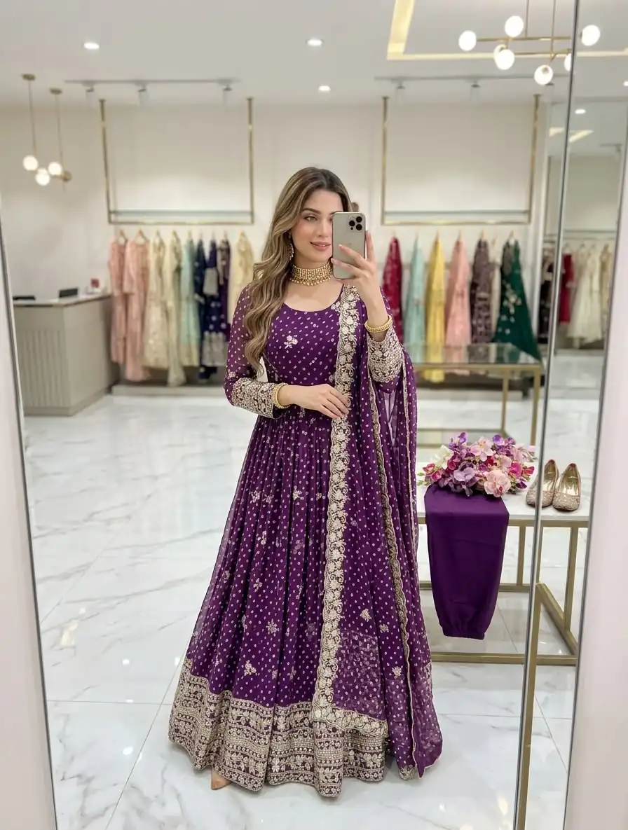 WW 1283 Wine in Colour Faux Georgette Bandhani Print Work Gown. Available at ₹2399 only. Delivery 4-6 Working Days. Shop now. | Bollywood Gowns, Creative Gowns, Designer Gowns, Embroidered Gowns, Gowns, Party Wear Gowns