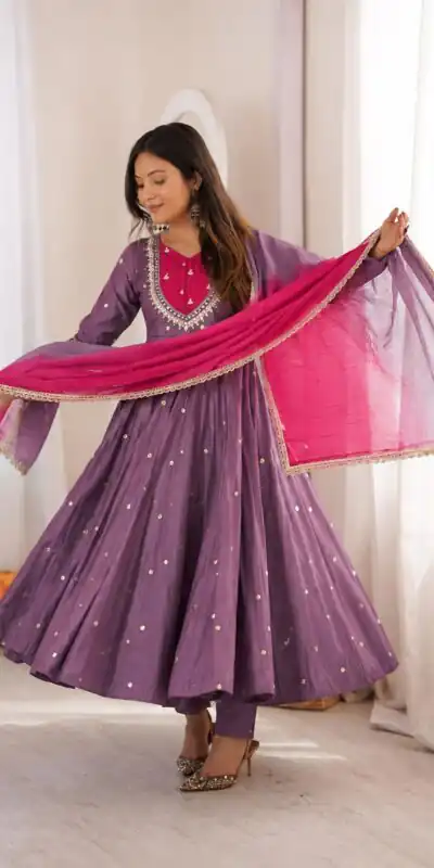 ZF 5023 Lavender Roman Silk Gown with Mirror Work & Embroidery Work. Special Price ₹2099. Delivery 4-6 Working Days. Shop now. | Bollywood Gowns, Creative Gowns, Designer Gowns, Embroidered Gowns, Gowns, Party Wear Gowns