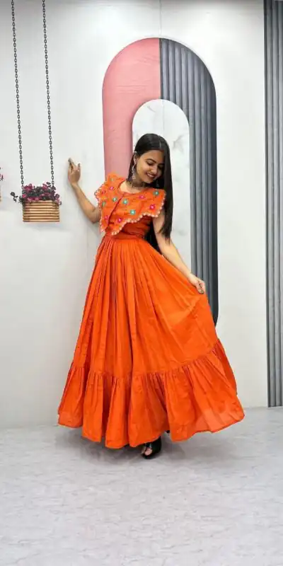 PC 571 Orange Roman Silk Gown with Mirror Work & Embroidery Work. Special Price ₹2099. Delivery 4-6 Working Days. Shop now. | Bollywood Gowns, Creative Gowns, Designer Gowns, Embroidered Gowns, Gowns, Party Wear Gowns