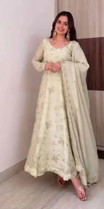 SRK 5374 Off White Fendy Silk Gown with Embroidery Work & Sequins Work. Special Price ₹2399. Delivery 4-6 Working Days. Shop now. | Bollywood Gowns, Creative Gowns, Designer Gowns, Embroidered Gowns, Gowns, Party Wear Gowns