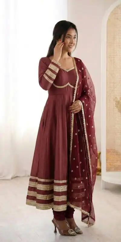 ZF 5017 Maroon Color Cosmos Gold Gown with Embroidery Work & Lace Work. Get it for ₹2099. Delivery 4-6 Working Days. Shop now. | Bollywood Gowns, Creative Gowns, Designer Gowns, Embroidered Gowns, Gowns, Party Wear Gowns