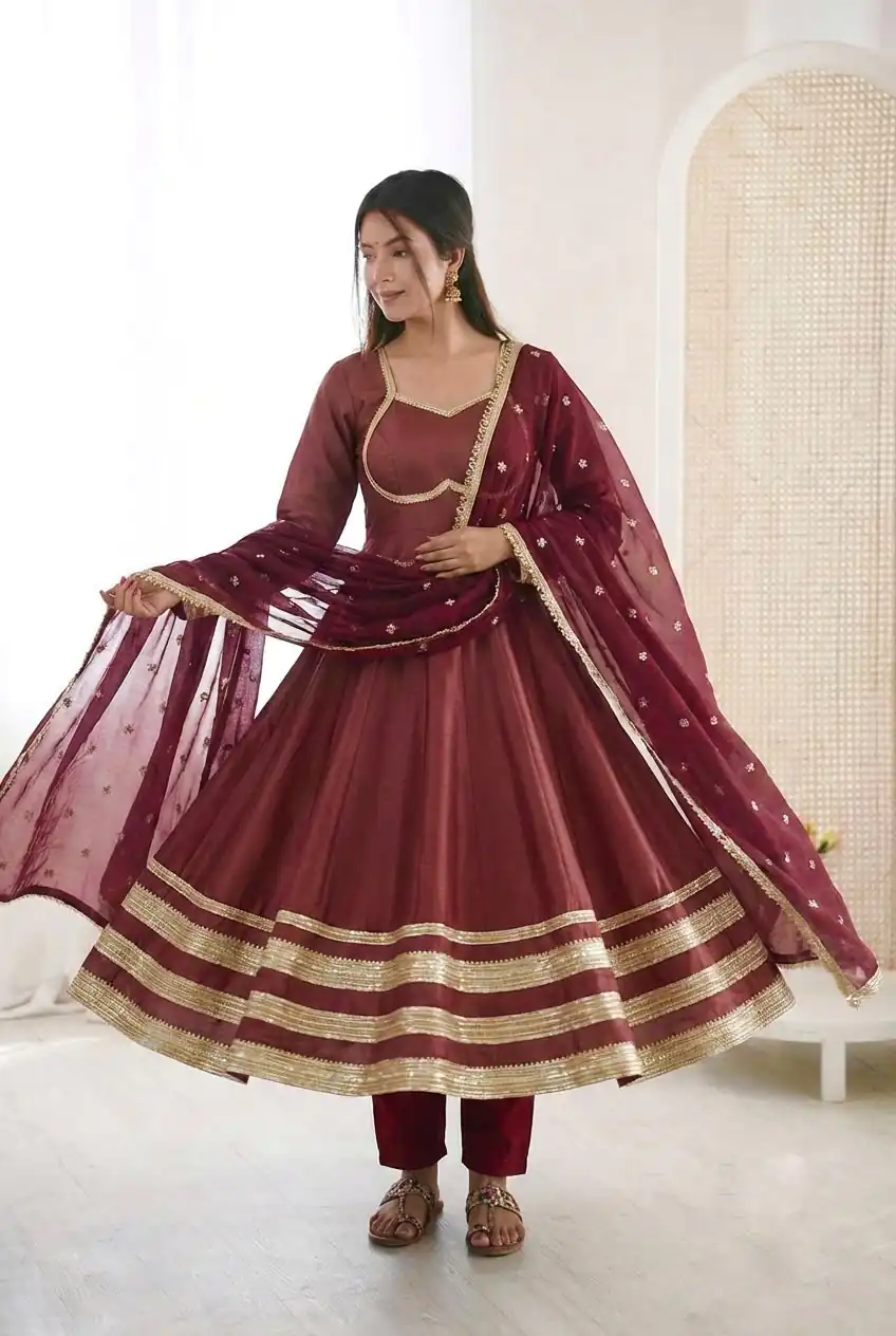 ZF 5017 Maroon Color Cosmos Gold Gown with Embroidery Work & Lace Work. Get it for ₹2099. Delivery 4-6 Working Days. Shop now. | Bollywood Gowns, Creative Gowns, Designer Gowns, Embroidered Gowns, Gowns, Party Wear Gowns