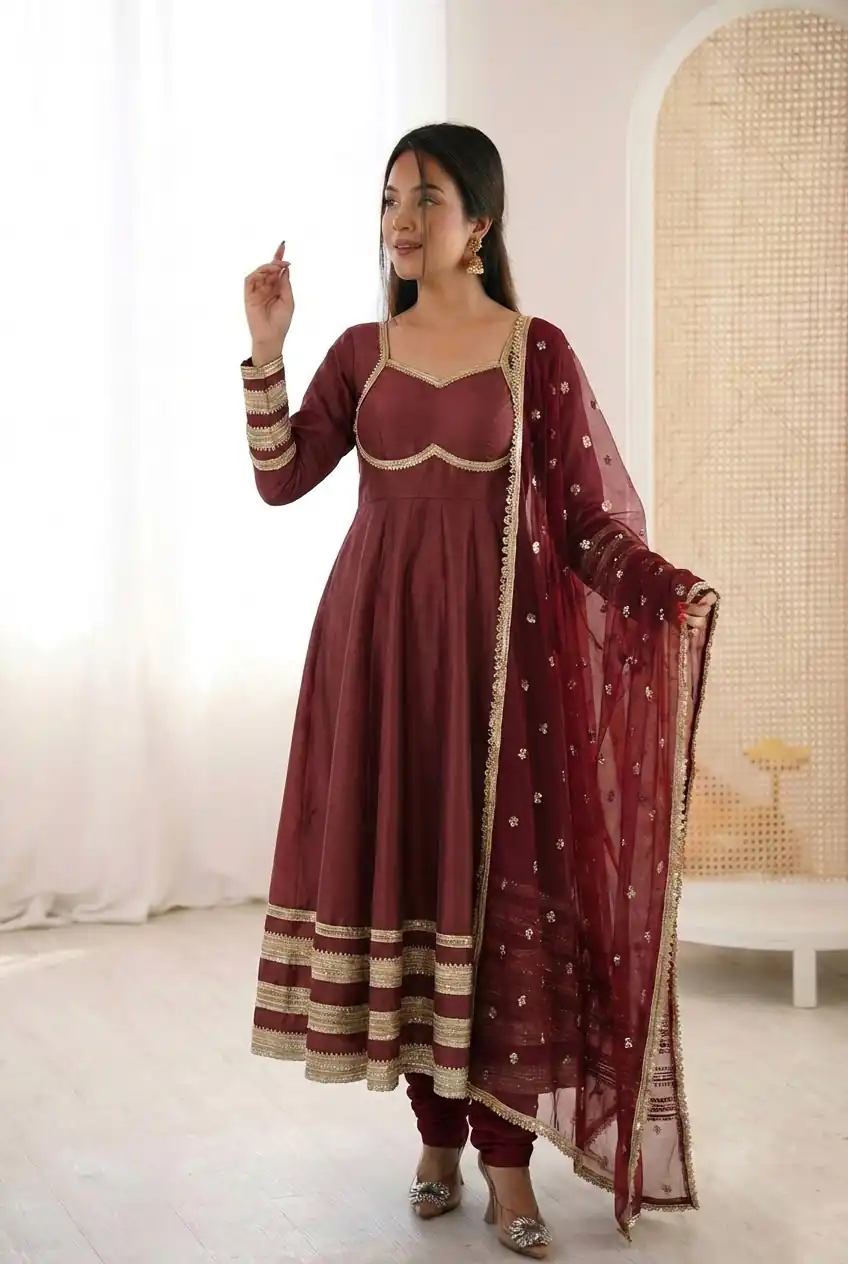 ZF 5017 Maroon Color Cosmos Gold Gown with Embroidery Work & Lace Work. Get it for ₹2099. Delivery 4-6 Working Days. Shop now. | Bollywood Gowns, Creative Gowns, Designer Gowns, Embroidered Gowns, Gowns, Party Wear Gowns