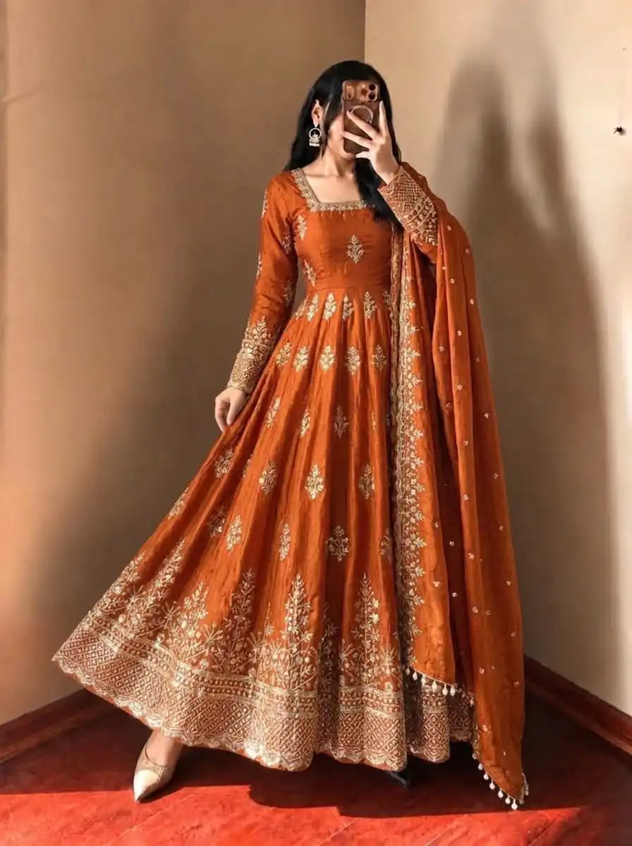 NSR 918 Orange Fendy Silk Gown with Embroidery Work & Sequins Work. Special Price ₹2399. Delivery 4-6 Working Days. Shop now. | Bollywood Gowns, Creative Gowns, Designer Gowns, Embroidered Gowns, Gowns, Party Wear Gowns