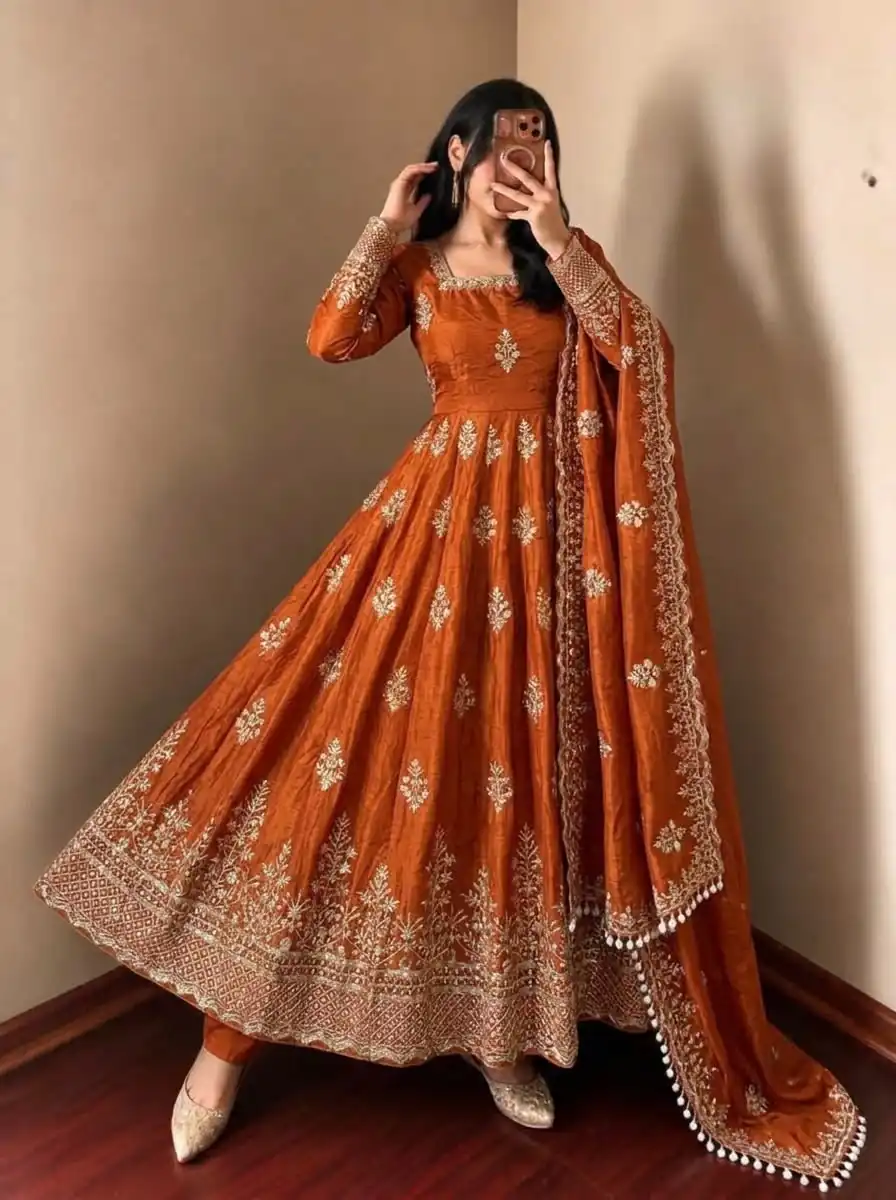 NSR 918 Orange Fendy Silk Gown with Embroidery Work & Sequins Work. Special Price ₹2399. Delivery 4-6 Working Days. Shop now. | Bollywood Gowns, Creative Gowns, Designer Gowns, Embroidered Gowns, Gowns, Party Wear Gowns