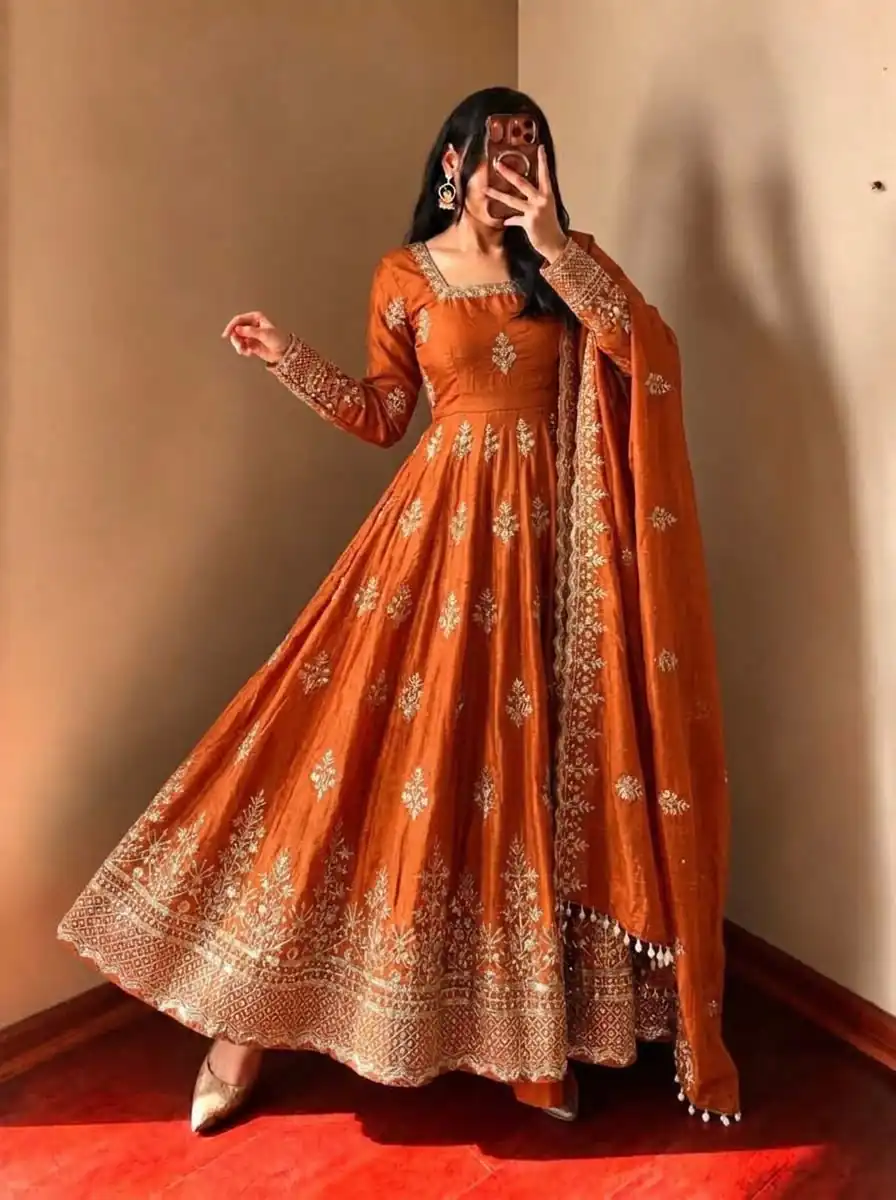 NSR 918 Orange Fendy Silk Gown with Embroidery Work & Sequins Work. Special Price ₹2399. Delivery 4-6 Working Days. Shop now. | Bollywood Gowns, Creative Gowns, Designer Gowns, Embroidered Gowns, Gowns, Party Wear Gowns