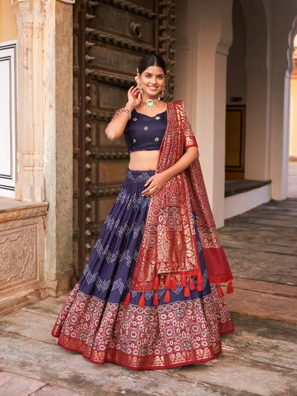 Glamorous Navy Blue Color Tussar Silk Dot And Ajarakh & Drawstring With Foil Printed & Heavy Tassels Lehenga Choli