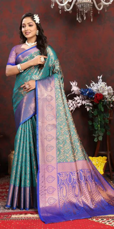 Dazzling Rama Green Color Lichi Silk Gold & Cooper Zari Saree