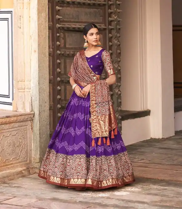Glamorous Purple Color Tussar Silk Dot And Ajarakh & Drawstring With Foil Printed & Heavy Tassels Lehenga Choli