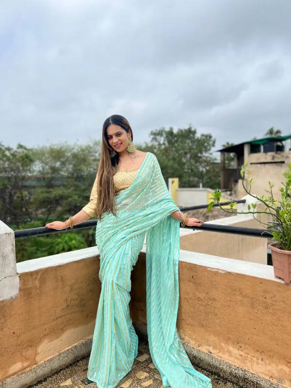 Glamorous Sky Blue Color Georgette Sequence Work Saree