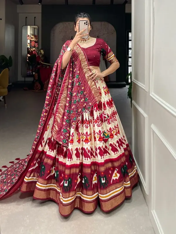 Exclusive Off White Color Tussar Silk Patola Printed Lehenga Choli
