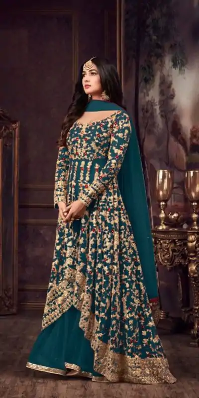 Maisha Women's Wear Peacock Blue Color Heavy Net Embroidered Stone Work Sharara Suit