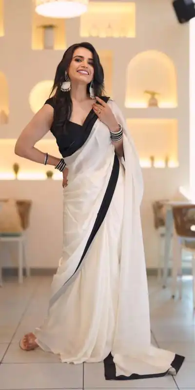 Exemplary White Color Heavy Japan Satin Less Border Saree