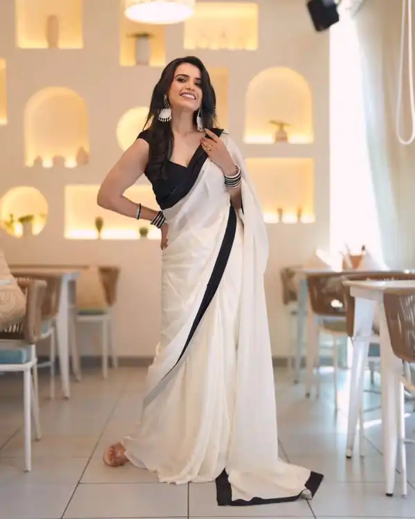 Exemplary White Color Heavy Japan Satin Less Border Saree