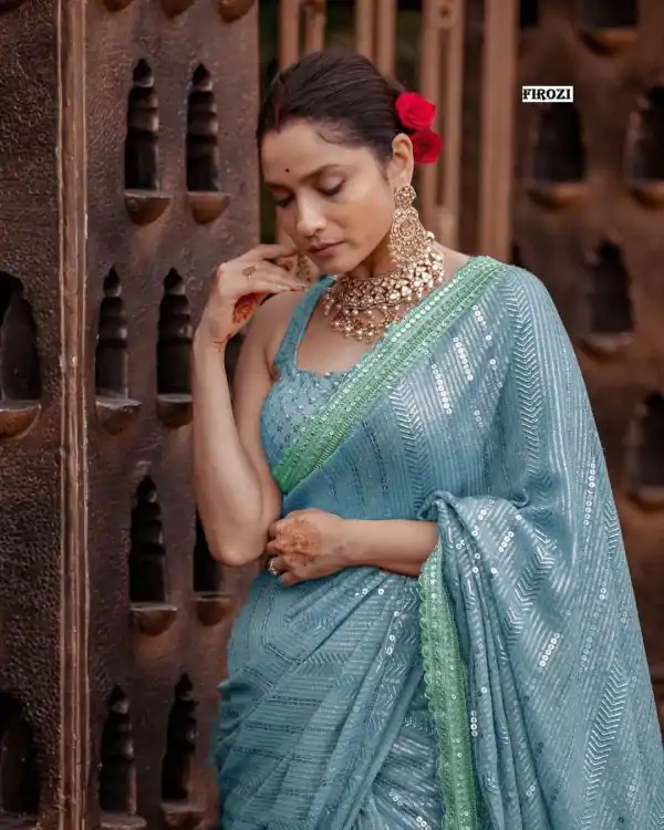 Majestic Firozi Color Georgette Beautiful Embroidery Saree