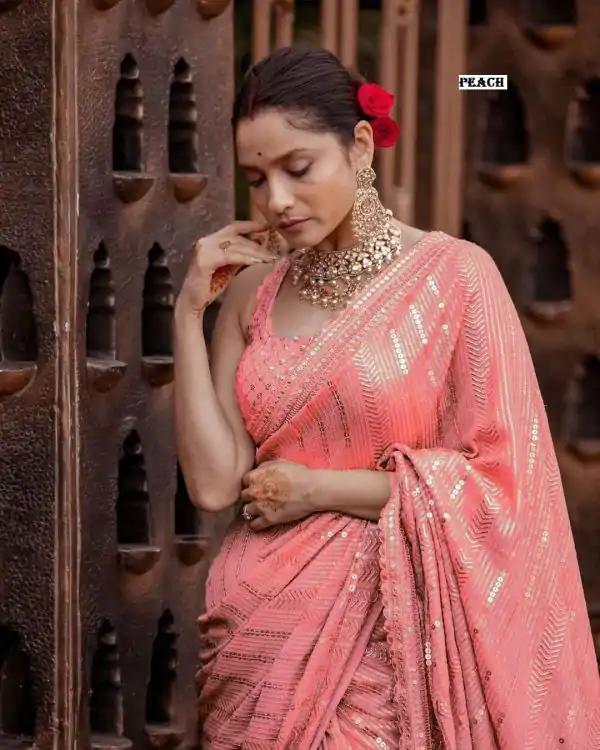 Majestic Peach Color Georgette Beautiful Embroidery Saree