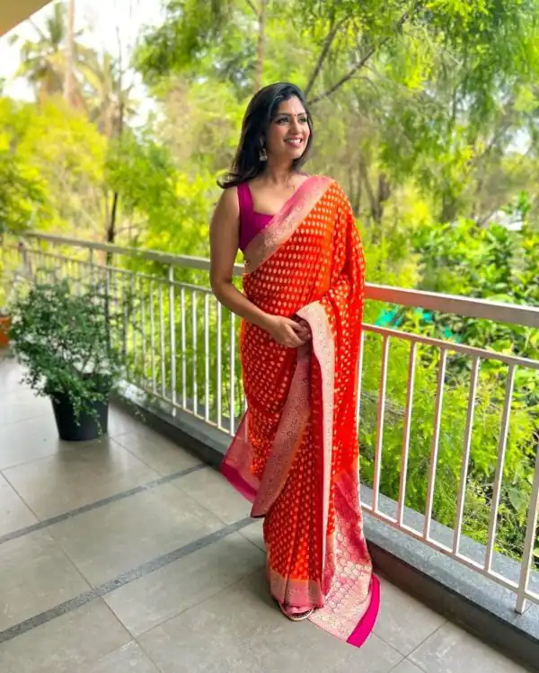 Mystical Orange Color Soft Silk Golden Zari Design Work Saree