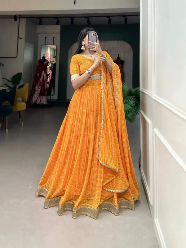 Pretty Mustard Color Georgette Print With Lace Border Lehenga Choli