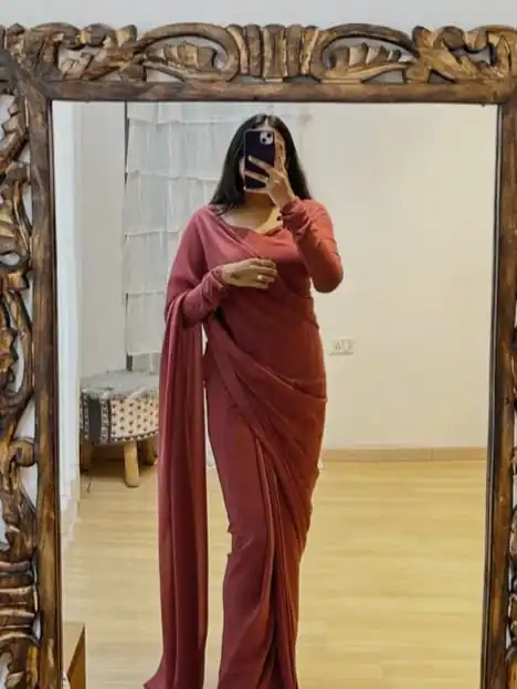Pretty Peach Color Soft Georgette Silk Design All Over Work Saree