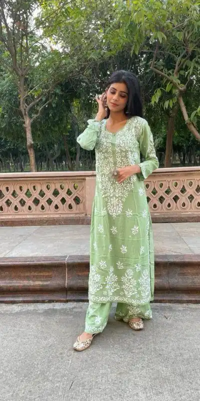 Splendorous Green Color Rayon Chine Stitched Work Salwar Suit