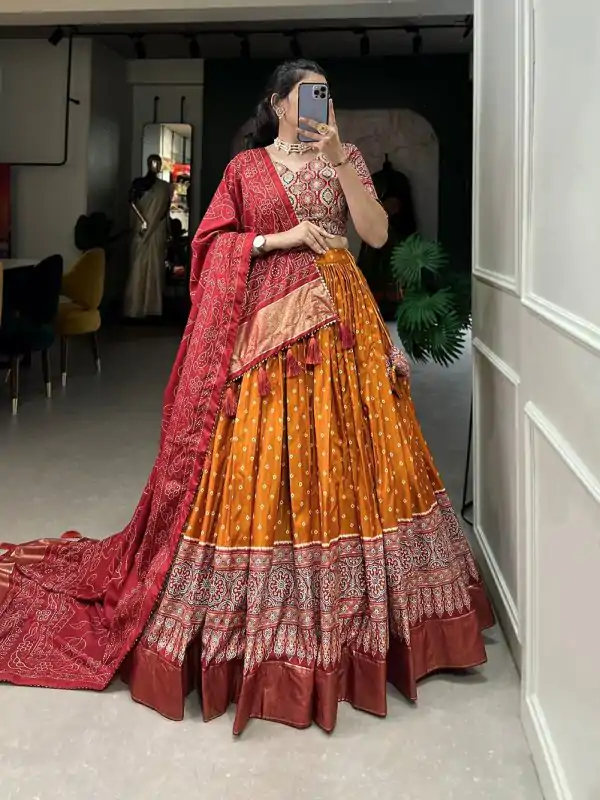 Stylish Yellow Color Tussar Patola Print Foil Work Lehenga Choli