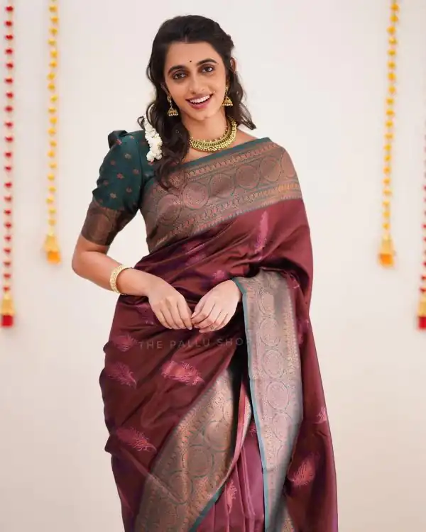 Sublime Maroon Color Soft Silk Copper Zari Design Spread Saree