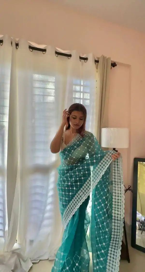 Sublime Peacock Green Color Organza Embroidery Thread Saree