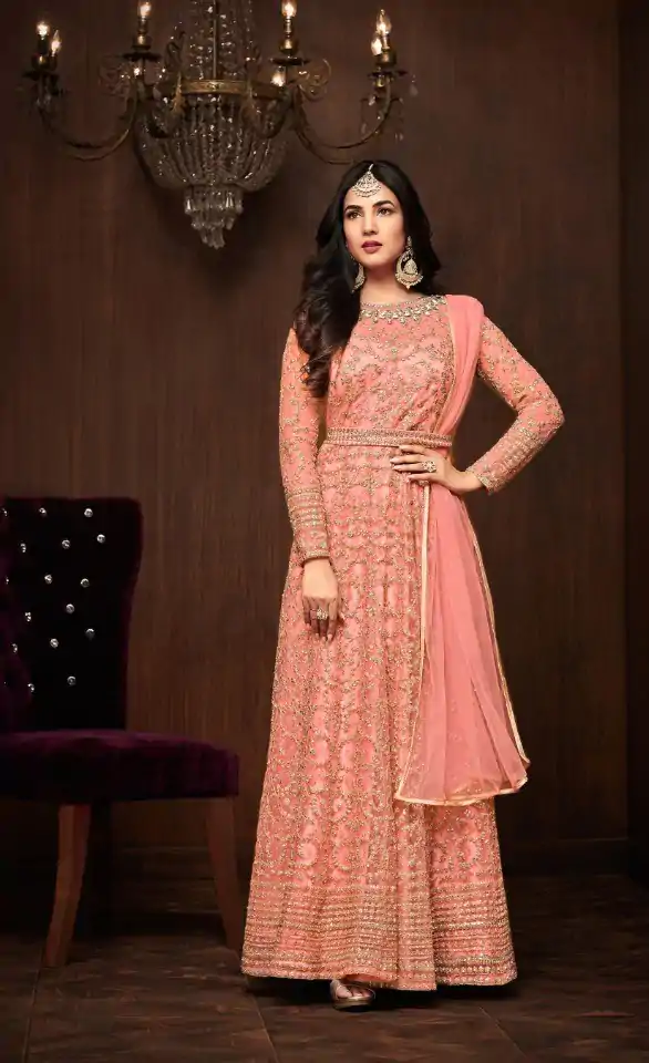 Charm Light Orange Color Vaishnavi Net Embroidery Sharara Suit