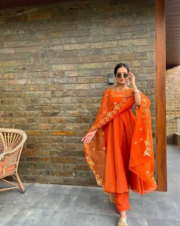 Sublime Orange Color Georgette Coin Lace Border Salwar Suit
