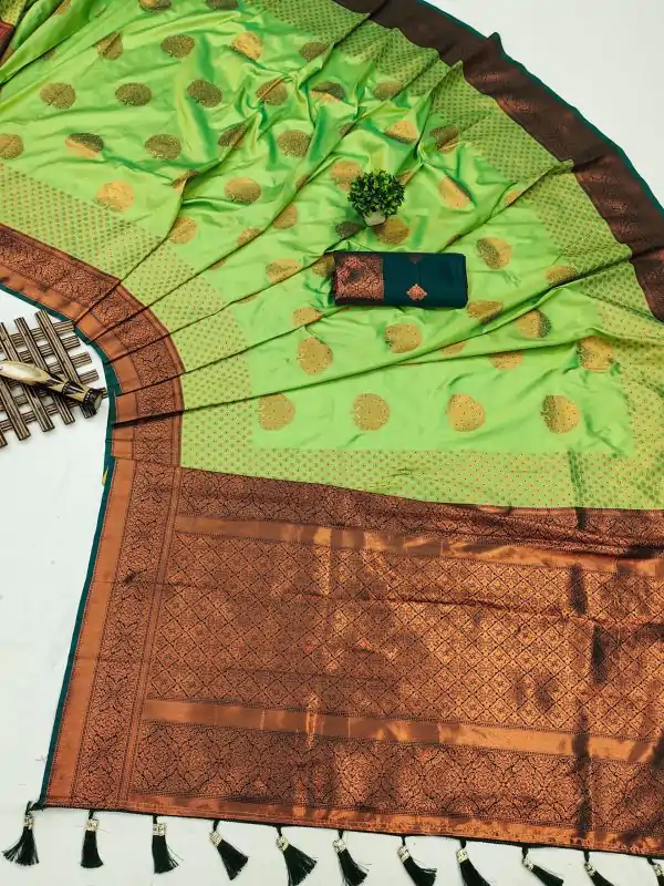 Superb Parrot Green Color Soft Silk Copper Zari Design Saree