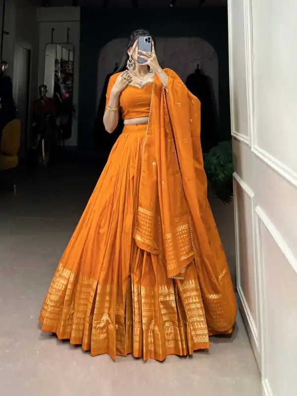 Pretty Orange Color Pure Chanderi Plain With Zari Weaving Work Border Lehenga Choli