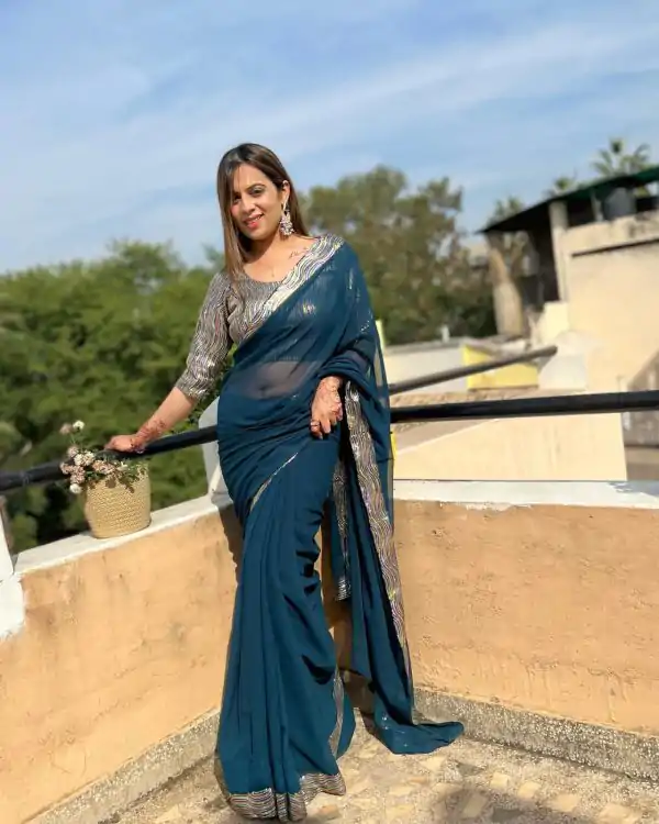 Wonderful Peacock Blue Color Georgette Sequence Work Lace With Peiping Saree