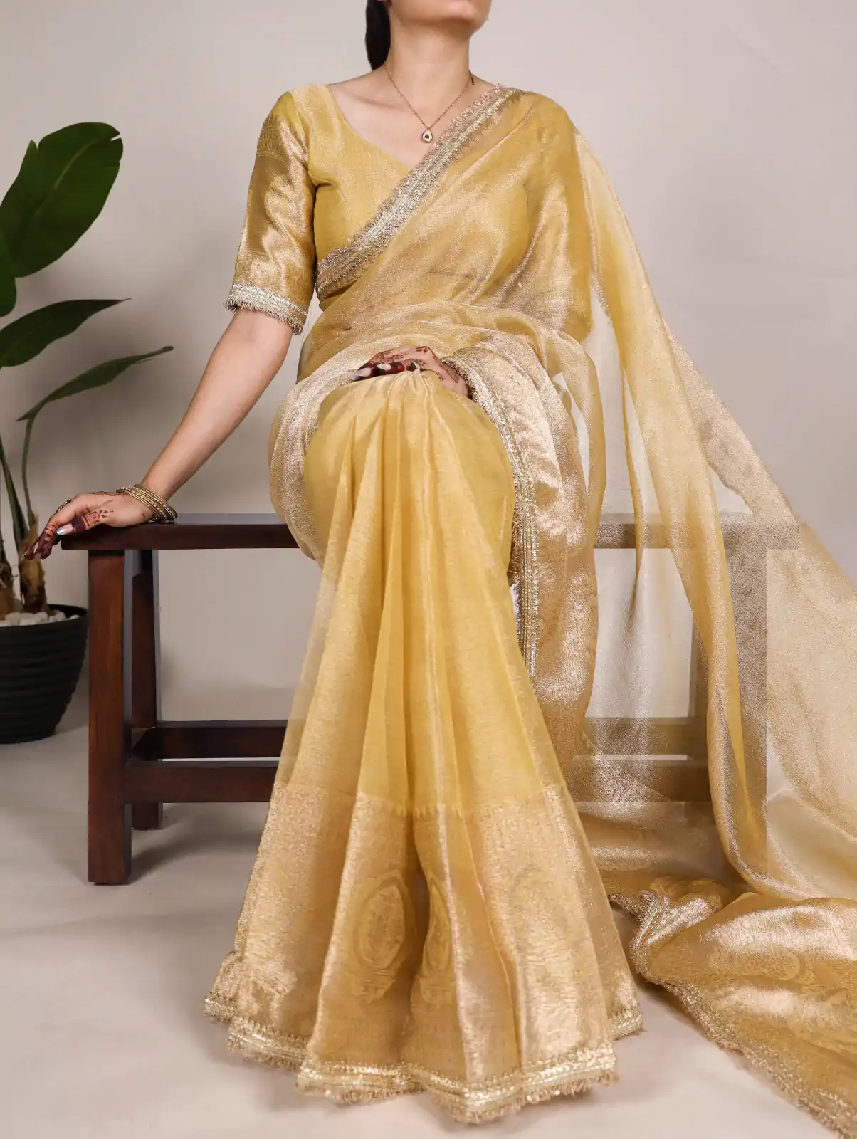 Attractive Gold Color Tissue Shimmer Zari Weaving Work Saree - Image 3